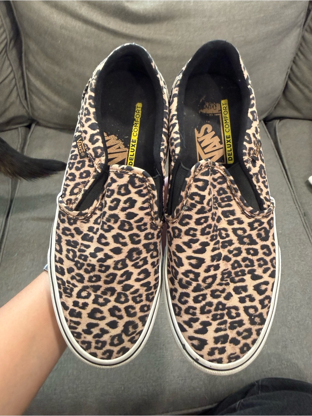 Vans Leopard Print Slip-On Sneakers in Black and Tan